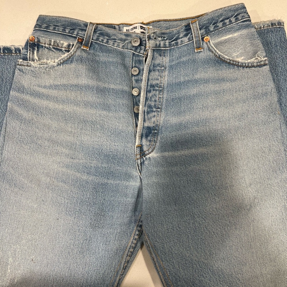 SHOP REDONE NEVER WORN Vintage Levis size 28, button fly, rips.